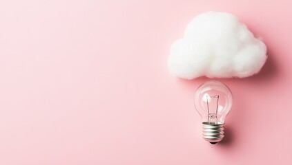 Cloud computing concept; lightbulb under fluffy cloud on pink