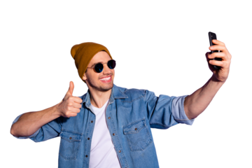 Photo of toothy cheerful attractive youngster blogger giving positive feedback by video call on telephone taking selfie smiling beaming showing thumb up isolated over purple vivid color background