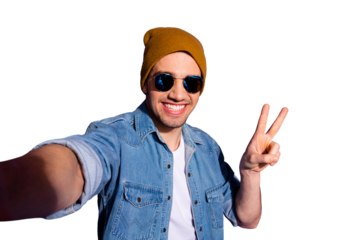 Self portrait of trendy cheerful kind stylish attractive handsome guy taking selfie showing you v-sign smiling toothily isolated over vivid purple color background