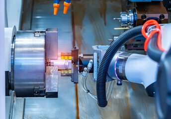CNC lathe jaw clamping raw material steel rod .Hi-precision CNC machining concept