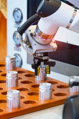 CNC lathe jaw clamping raw material steel rod .Hi-precision CNC machining concept