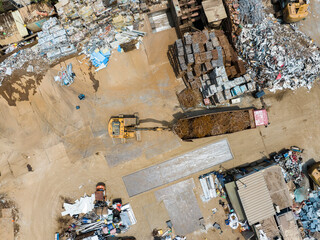 Aerial view of Trash disposal for recycling and re-use. Recycling of Construction rebar  waste or debris Industrial scrap Processing.