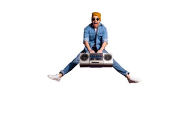 Full length body size photo of screaming cheerful handsome music lover shouting with having won retro recorder wearing jeans jacket brown cap headwear isolated over purple vivid color background