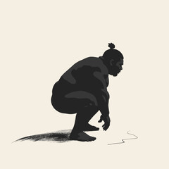Obraz premium Monochrome sumo wrestler in squatting stance, ready for match