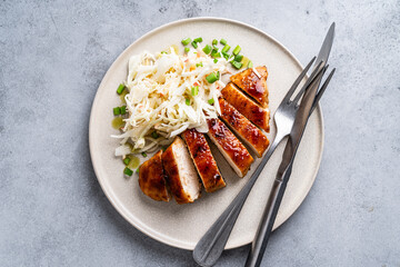Roasted chicken breast with fresh cabbage apple coleslaw salad