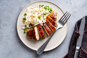 Roasted chicken breast with fresh cabbage apple coleslaw salad