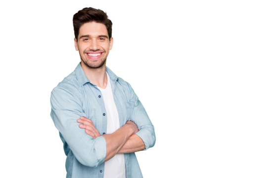 Photo of amazing business guy in excited mood with crossed hands looking forward to start working day wear casual denim shirt isolated over green color background