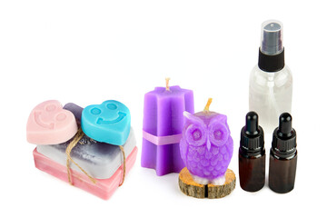 Lavender candle, soap, oil and lotion, isolated on white background. Free space for text. Collage.