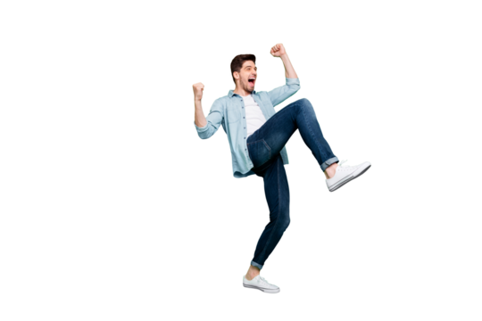 Full length body size turned photo of cheerful positive excited ecstatic man rejoicing with his victory at competitions isolated over green color vivid background