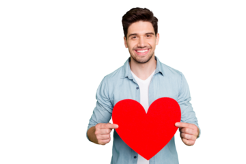 Photo of cheerful positive cute handsome man showing heart shape big red demonstrating his love to you isolated over green vivid color background