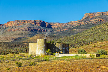 Abandoned water storage tank in mountains