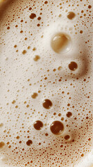 Creamy cappuccino foam with swirling patterns and bubbles, a macro and full-frame texture shot, close-up texture, top view