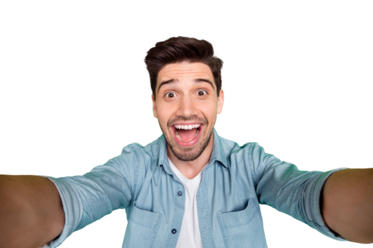 Self portrait of cheerful positive handsome man taking selfie having holidays on vacation relax fun isolated over green color vivid background