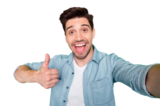 Photo of cheerful positive attractive ecstatic man at leisure showing you thumb up leaving feedback excellent shouting isolated over green vivid color background