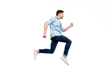 Full length photo of handsome guy jumping high sportive competition participant running fast wear casual denim clothes isolated green color background