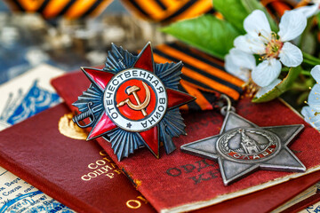 Naklejka premium Orders and medals of the USSR.Awards of the Second world war close-up.Victory Day - 9 of may 1945. Soviet military awards.Phaleristics.Antikvariat.
