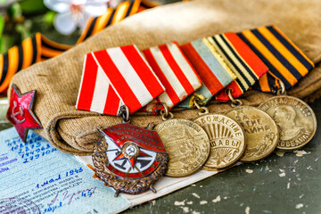 Naklejka premium Orders and medals of the USSR.Awards of the Second world war close-up.Victory Day - 9 of may 1945. Soviet military awards.Phaleristics.Antikvariat.