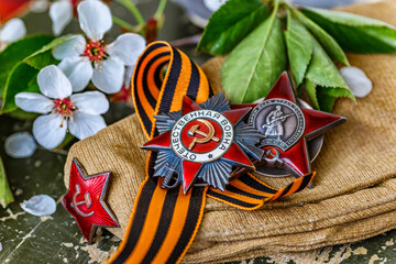 Naklejka premium Orders and medals of the USSR.Awards of the Second world war close-up.Victory Day - 9 of may 1945. Soviet military awards.Phaleristics.Antikvariat.