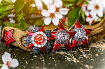 Naklejka premium Orders and medals of the USSR.Awards of the Second world war close-up.Victory Day - 9 of may 1945. Soviet military awards.Phaleristics.Antikvariat.