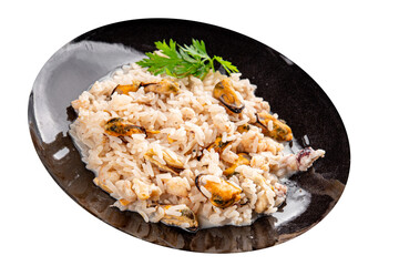 Rice seafood risotto mussels, shrimp, prawn, rapan, squid vegetable dish fresh gourmet food background on the table rustic food top view copy space