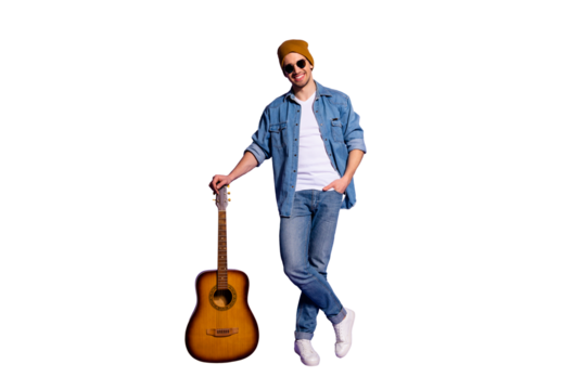 Full length body size photo of cheerful positive cute attractive handsome music maker leaning upon his guitar wearing cap sneakers footwear isolated purple bright color background