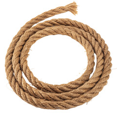 Thick natural rope coiled in a circle.
