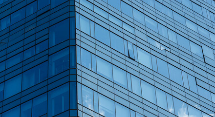 Obraz premium Modern Architecture Blue Glass Building Facade Design And Urban Landscape