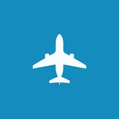 Fototapeta premium a white airplane in the blue sky