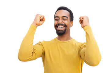 Bearded man in yellow sweater celebrating, triumphantly raising fists against transparent background