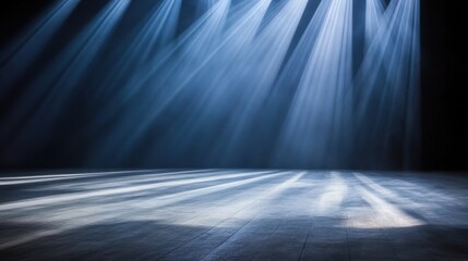 A dramatic spotlight shines through a darkened space, creating shadows on the wooden floor, This versatile image can be used for theatrical promotions, event announcements, or artistic projects,