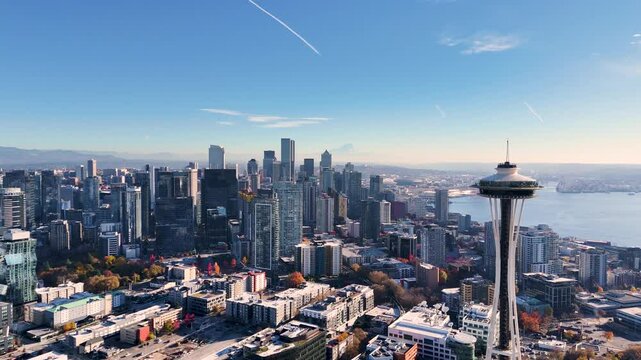Daytime Aerial Panorama of Seattle Skyline with Iconic Space Needle and Waterfront. Top cinematic aerial view. Washington USA
