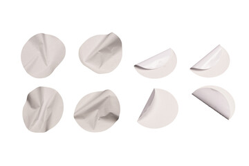 Round white stickers, blank tags labels isolated on a white background.