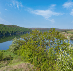 Amazing spring view on the Dnister River Canyon with picturesque rocks, fields, flowers. This place named Shyshkovi Gorby,  Nahoriany, Chernivtsi region, Ukraine.