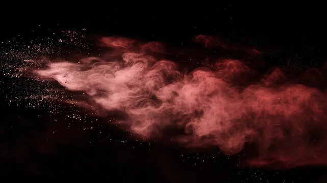 red and white explosion of dust and debris. The red and white colors are vibrant and eye-catching, creating a sense of energy and excitement. The image is dynamic and full of movement, as the dust