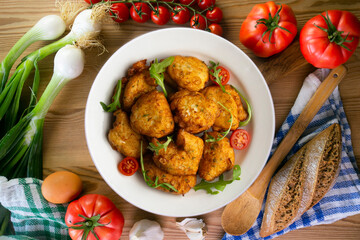 Cod fritters, a traditional Spanish tapa. Top view table.