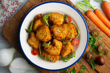 Cod fritters, a traditional Spanish tapa. Top view table.