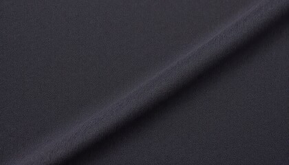 Obraz premium Deep navy blue fabric texture closeup, ideal for backgrounds and design projects