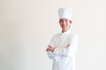 コック帽を被った調理師の男性