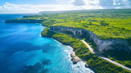 Fototapeta premium From an aerial view, the winding river cuts through the green landscape under a vast sky
