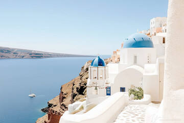 Obraz premium Picturesque Santorini Island Scene Featuring White Buildings Blue Domed Churches And Turquoise Sea Under Clear Sky