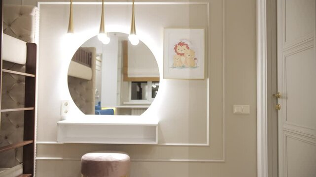White vanity table with round mirror and pendant lights