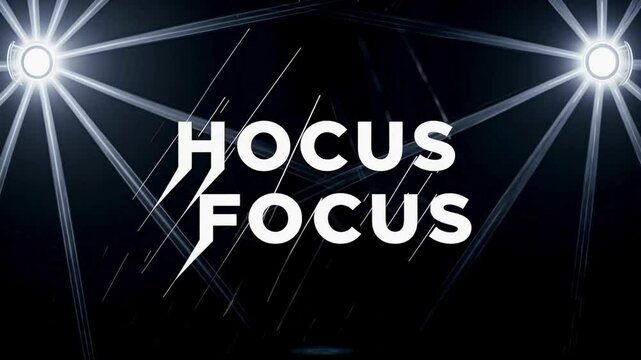 Hocus Focus spotlight text on black background with light beams