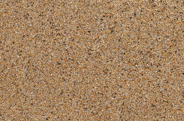 Close-up of golden background with beach sand texture