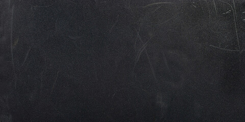 Scratched plastic surface with rough texture, seen up close	