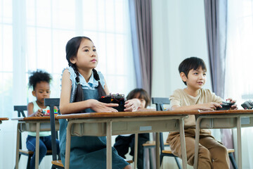 Group of diverse children enjoy learning about the STEM.