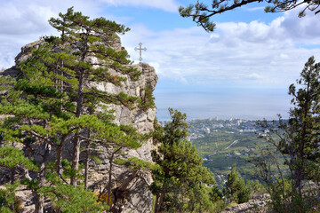 View of Mount Stavri-Kaya with a cross on top. Botkin trail, view from the mountain to the sea.