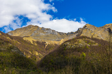 Fototapeta premium Mont Béas Mountain Overlooking the Village of Aulus-les-Bains, in the Pyrenees Region of Haut-Couserans, Ariège