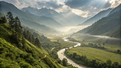Lush green valley with a winding river, surrounded by misty mountains under dramatic sunlight and cloud cover.