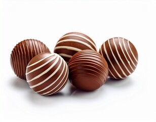isolated photo of striped chocolate spheres with white background