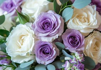 Obraz premium Beautiful bouquet of lavender and white roses with green leaves arranged elegantly for a perfect floral decoration and centerpiece design